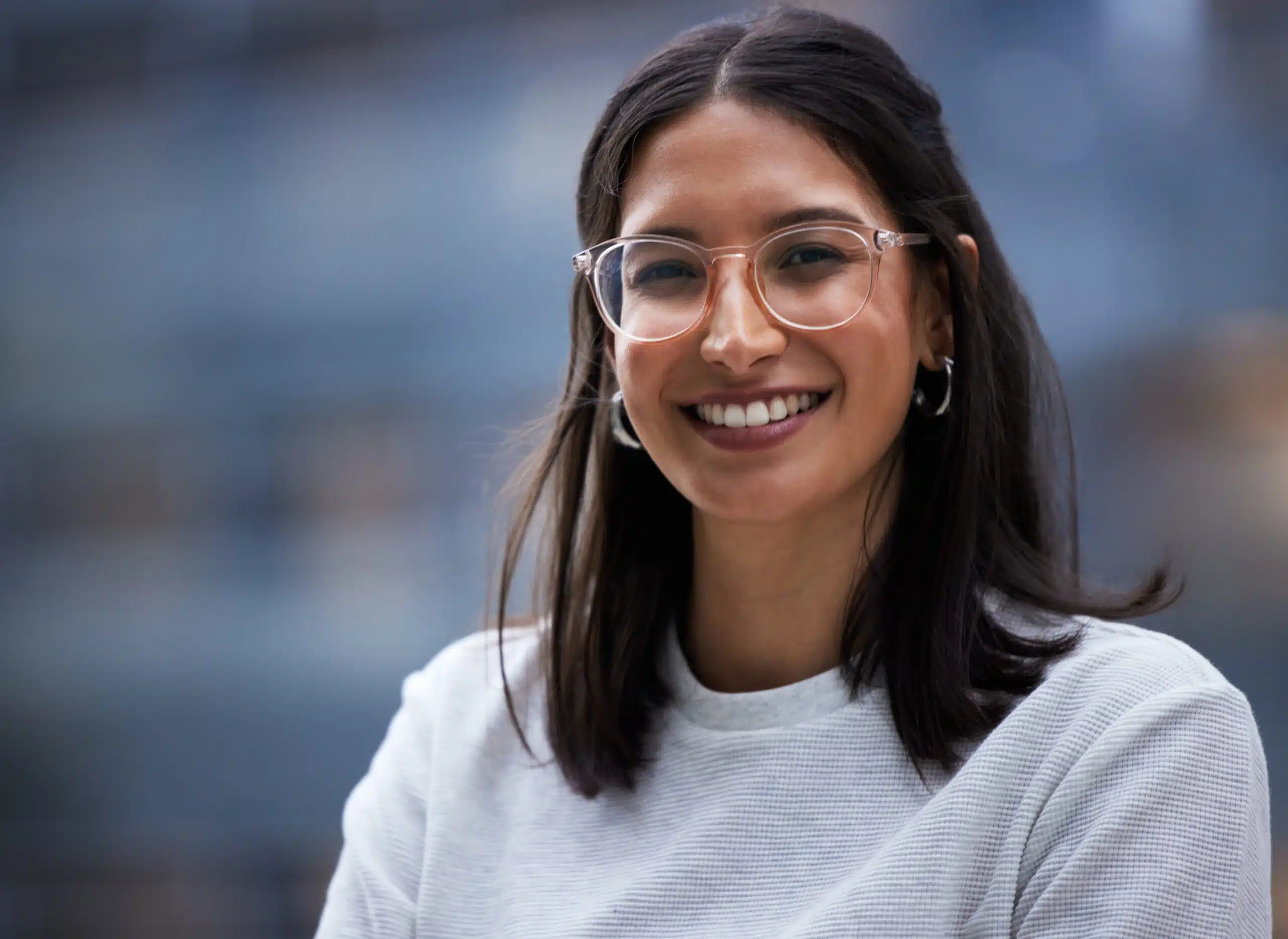 Woman with a healthy smile wearing glasses