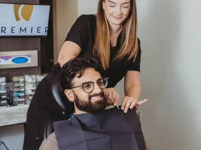 Dentist discussing a personalized treatment plan with a patient